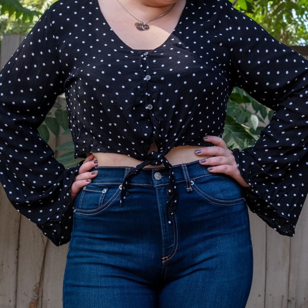 Bell sleeve polka dot top.